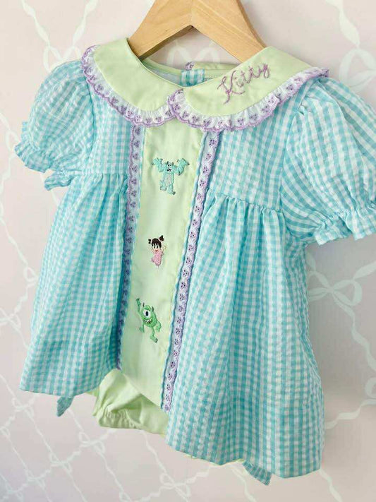 “Monsters” made to match outfit pictured. 5.5 inches on clip or thin nylon band. (Outfit not included).